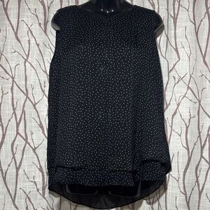 Elegant Black Sleeveless Blouse with White Dots
